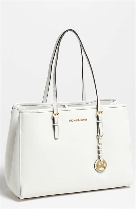 Michael Kors optic white handbags